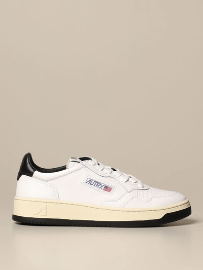 Shop Autry Sneakers In Leather With Contrasts In White
