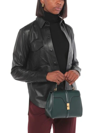 Shop Celine Handbag In Dark Green
