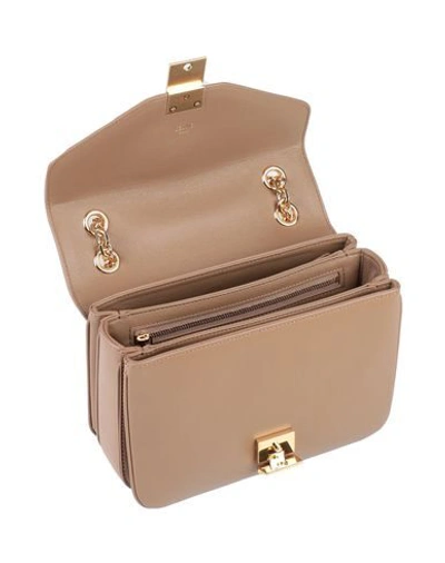 Shop Celine Handbags In Camel