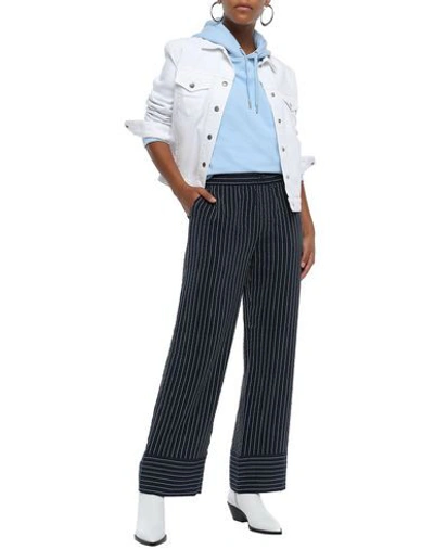 Shop Ganni Pants In Dark Blue