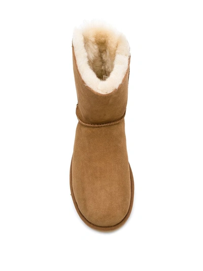 Shop Ugg Mini Bailey Bow Boots In Brown