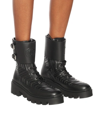 Shop Gucci Frances Leather Combat Boots In Black