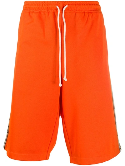 Shop Gucci Interlocking G Stripe Track Shorts In Orange