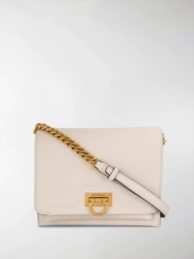 Shop Ferragamo Gancini Detail Crossbody Bag In Neutrals