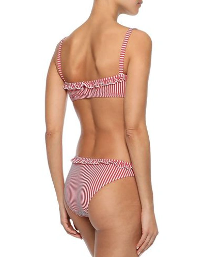 Shop Solid & Striped Bikini Bottoms In Red