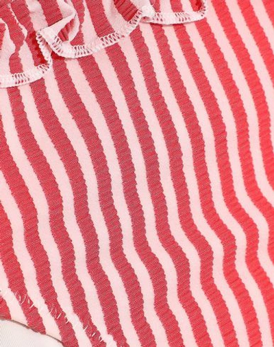 Shop Solid & Striped Bikini Bottoms In Red