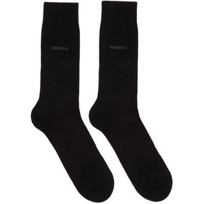 Shop Hugo Boss Boss Two-pack Grey And Black Diagonal Stripes Mismatched Socks In 001 Black