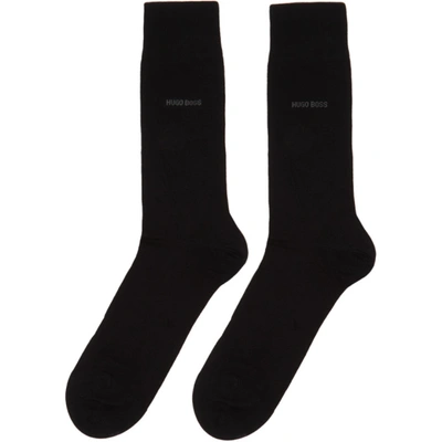 Shop Hugo Boss Boss Two-pack Grey And Black Diagonal Stripes Mismatched Socks In 001 Black