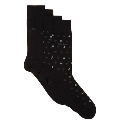 Shop Hugo Boss Boss Two-pack Black All Over Logo Socks In 001 Black