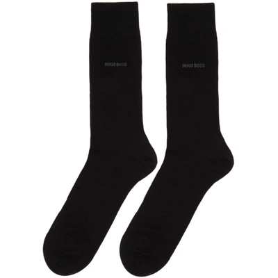 Shop Hugo Boss Boss Two-pack Black All Over Logo Socks In 001 Black