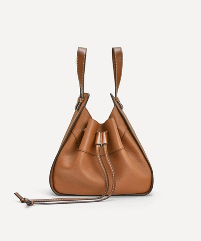 Shop Loewe Small Hammock Drawstring Leather Bag In Light Caramel
