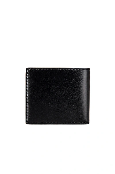 Shop Saint Laurent Ysl Credit Card Holder In Black