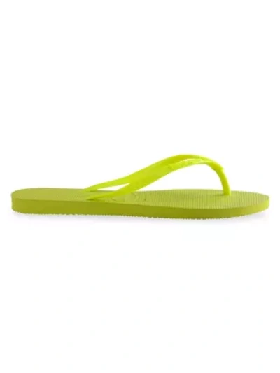 Shop Havaianas Slim Flip Flops In Galactic Green