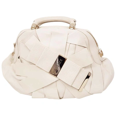 Shop Versace Ivory Leather Venita Bow Satchel From The 2009 Spring Collection In Neutrals