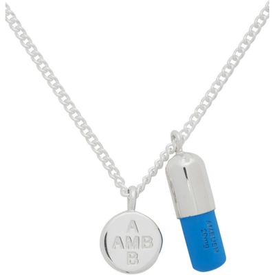 Shop Ambush Silver And Blue Pill Charm Necklace In Silver/blue