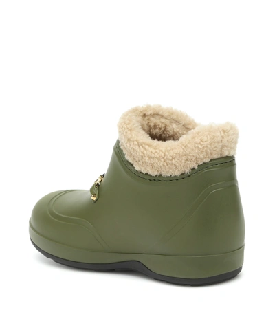 Shop Gucci Faux Shearling Rubber Ankle Boots In Green