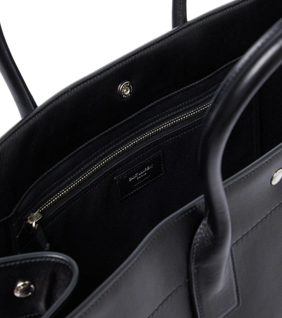 Shop Saint Laurent Rive Gauche Leather Tote Bag In Black