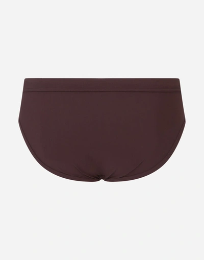 Shop Dolce & Gabbana Dg Patch Swim Briefs With High-cut Leg In Brown