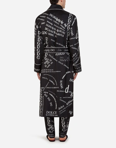 Shop Dolce & Gabbana Silk Robe With All-over Dg Logo Print In Black/white