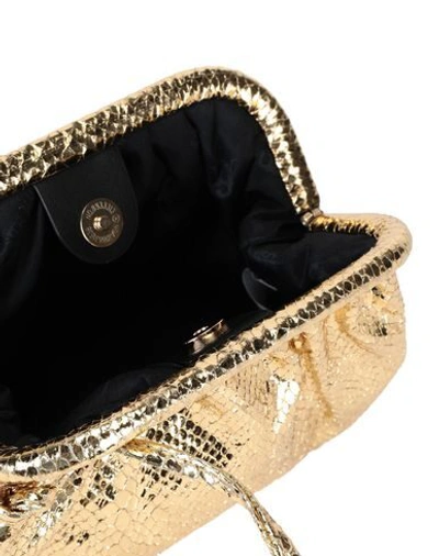 Shop Steve Madden Handbags In Gold