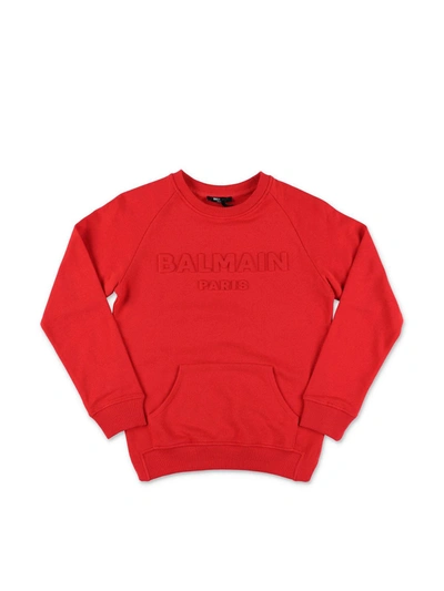 Shop Balmain Embossed Logo Sweatshirt In Red