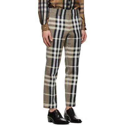 Shop Burberry Beige And Black Check Trousers In Dusty Sand
