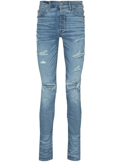 Shop Amiri Thrasher Distressed Skinny Jeans In Blue