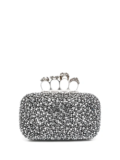 Shop Alexander Mcqueen Four-ring Embellished Clutch In Black