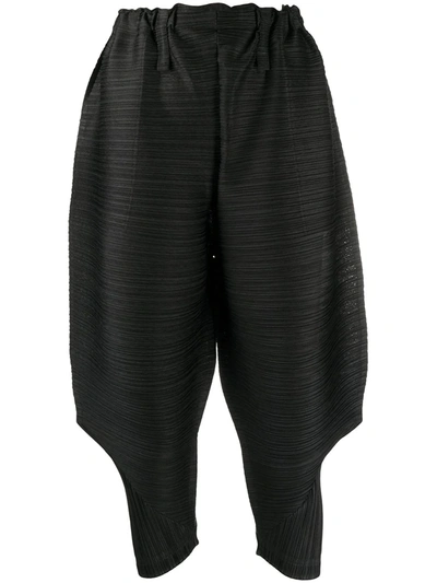 Shop Issey Miyake Pleated Cropped Balloon Trousers In Black