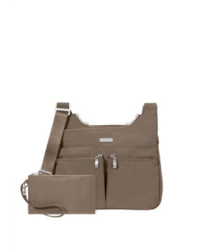 Shop Baggallini Cross Over Crossbody With Rfid In Taupe