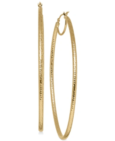 Shop Italian Gold Oval Hoop Earrings In 14k Gold