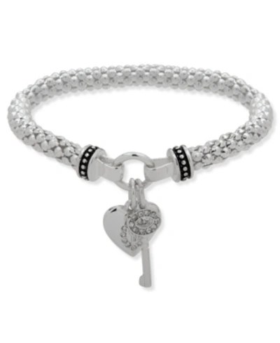 Shop Nine West Boxed Heart And Key Stretch Bracelet In Silver-tone