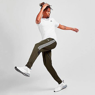 Shop Adidas Originals Adidas Sost Track Pants In Green