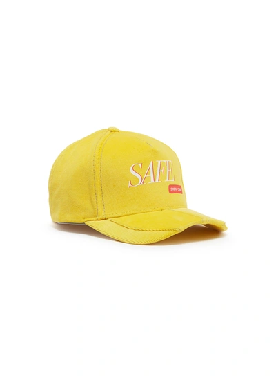 Shop Smfk 'safe' Slogan Print Corduroy Baseball Cap In Yellow