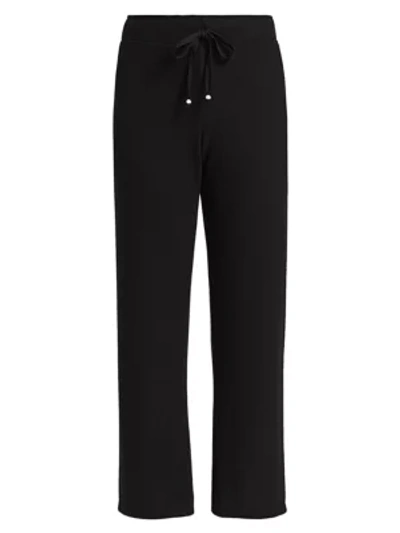 Shop Donni Cropped Flare Sweatpants In Black