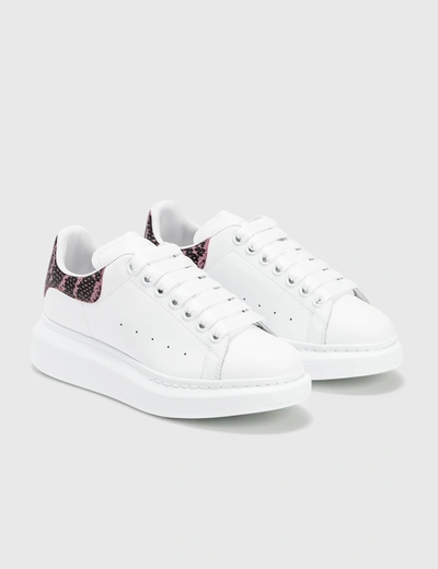 Shop Alexander Mcqueen Oversized Sneakers With Python Print In White / Pink