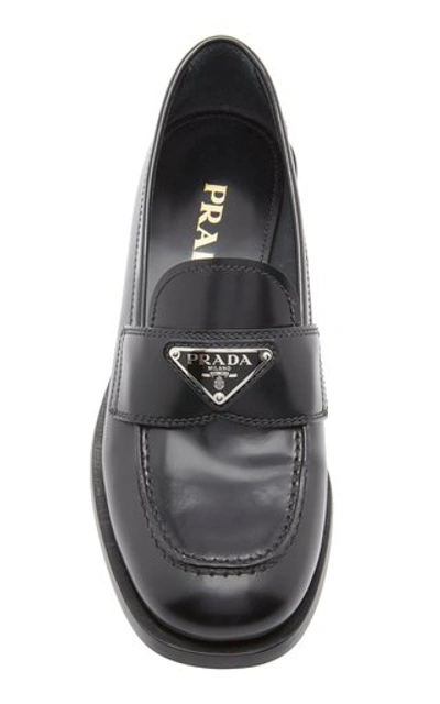 Shop Prada Leather Loafers In Black