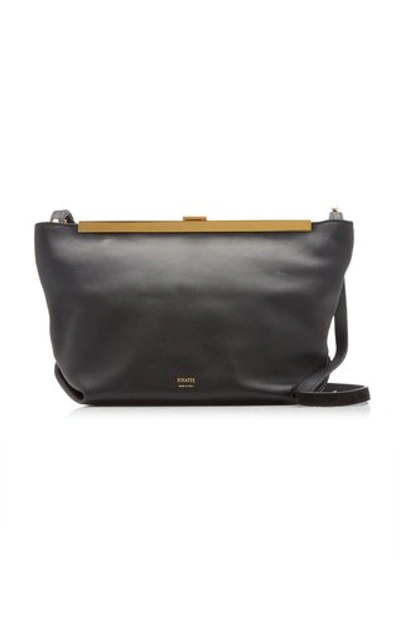 Shop Khaite Augusta Calf Leather Envelope Crossbody Bag In Black