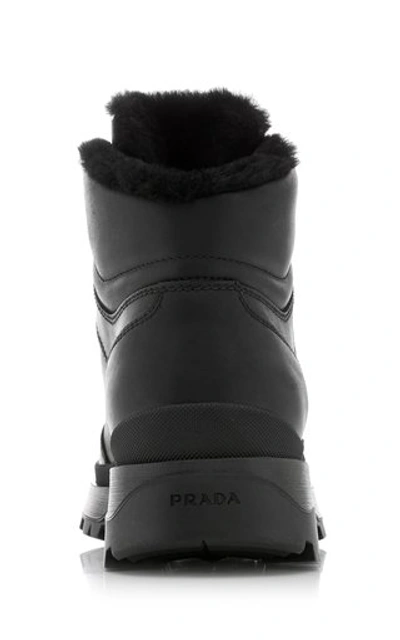 Shop Prada Montagna Ankle Boots In Black