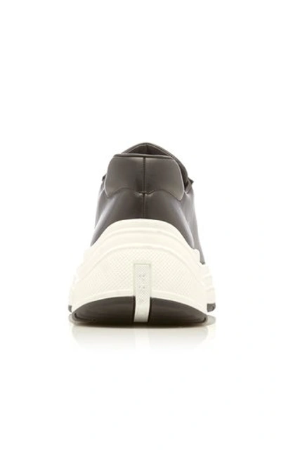 Shop Prada Barca Leather Sneakers In Black