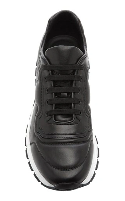 Shop Prada Leather Sneakers In Black