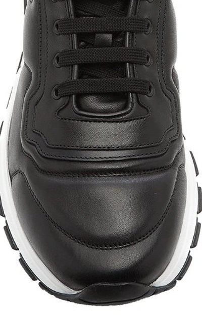 Shop Prada Leather Sneakers In Black