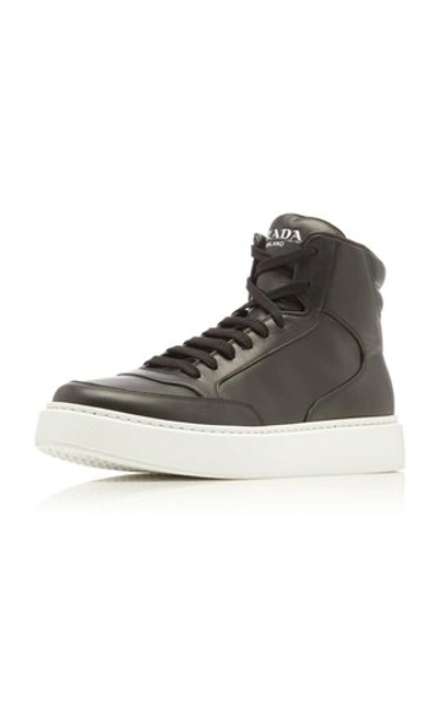 Shop Prada Leather High-top Sneakers In Black