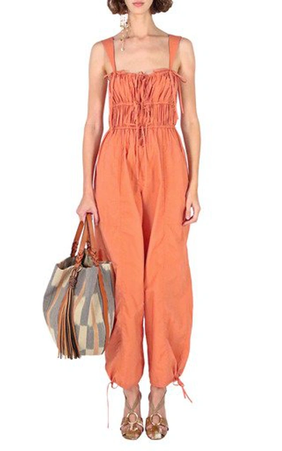Shop Ulla Johnson Women's Tatum Smocked Cotton Jumpsuit In Orange