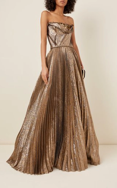 Shop Oscar De La Renta Embellished Lamã© Silk-blend Plissã© Strapless Gown In Gold