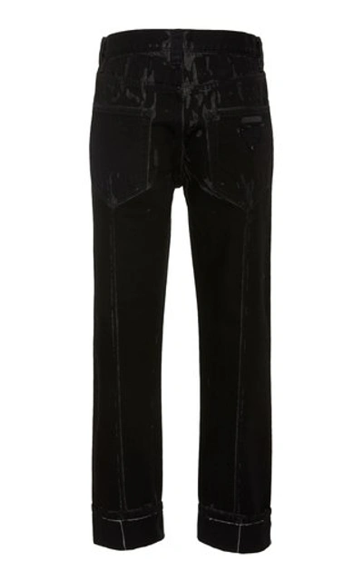 Shop Prada Overdyed Jeans In Black