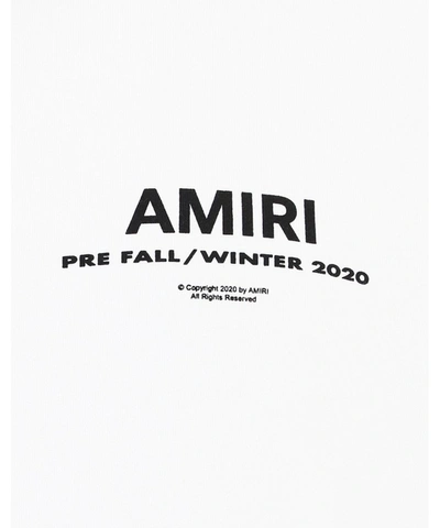 Shop Amiri Logo Print Hoodie In White