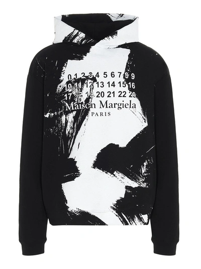 Shop Maison Margiela Paint Effect Hoodie In Black
