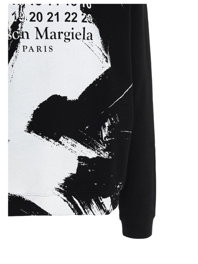 Shop Maison Margiela Paint Effect Hoodie In Black