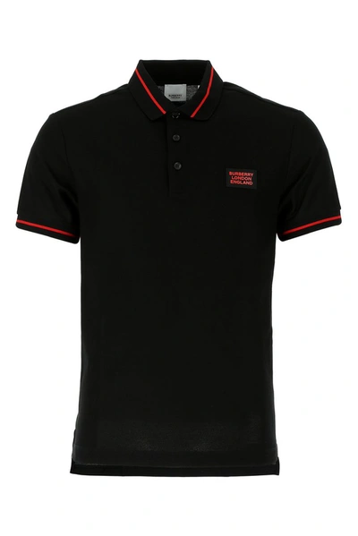 Shop Burberry Logo Polo Shirt In Black